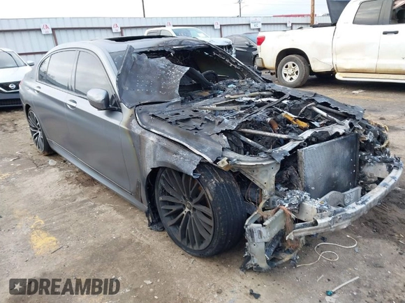 2018 BMW 7 Series 750i with VIN WBA7F0C55JGM23778, listed as a IAAI auction lot 41446517 with 88,498 mi miles. Bid and sale history available at carsss.com. Image 1.