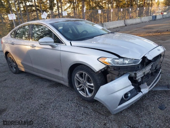 2015 Ford Fusion Energi Titanium with VIN 3FA6P0SU8FR264846, listed as a IAAI auction lot 41552443 with 160,142 mi miles. Bid and sale history available at carsss.com. Image 1.
