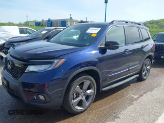 2020 Honda Passport Touring z VIN 5FNYF8H94LB015299, wystawiony jako IAAI lot #42064416 z przebiegiem 62 397 mil mil oraz . Historia ofert i sprzedaży dostępna na DreamBid. Obrazek 2.
