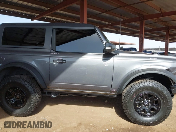 2021 Ford Bronco z VIN 1FMDE5CP3MLB06340, wystawiony jako IAAI lot #41681167 z przebiegiem 28 520 mil mil oraz . Historia ofert i sprzedaży dostępna na DreamBid. Obrazek 13.