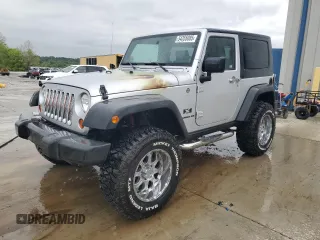2009 Jeep Wrangler X с VIN 1J4FA24139L713132, выставлен на аукционе Copart как лот 54355085 с пробегом 87 320 миль миль и Списание • Salvage title. История ставок и продаж доступна на DreamBid. Изображение 1.