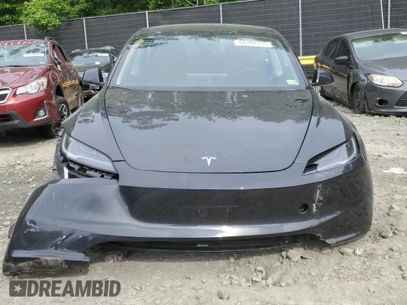 2025 Tesla Model 3 Long Range with VIN 5YJ3E1EAXSF878982, listed as a Copart auction lot 60302315 with 4,312 mi miles and Salvage title. Bid and sale history available at DreamBid. Image 5.