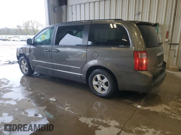 2010 Dodge Grand Caravan SXT with VIN 2D4RN5D1XAR268587, listed as a Copart auction lot 55072485 with 322,312 mi miles and Non Repairable. Bid and sale history available at DreamBid. Image 2.