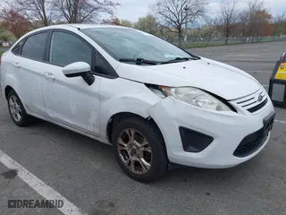 2013 Ford Fiesta S with VIN 3FADP4AJ5DM213417, listed as a IAAI auction lot 42023314 with 65,261 mi miles. Bid and sale history available at carsss.com. Image 1.