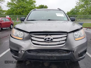 2011 Hyundai Santa Fe GLS z VIN 5XYZGDAB1BG027604, wystawiony jako IAAI lot #42219358 z przebiegiem 145 948 mil mil oraz . Historia ofert i sprzedaży dostępna na DreamBid. Obrazek 12.