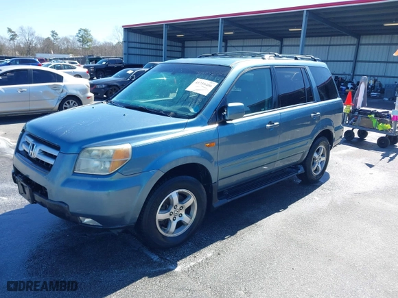 2006 Honda Pilot EX-L with VIN 5FNYF28586B004479, listed as a IAAI auction lot 41759406 with 301,087 mi miles. Bid and sale history available at carsss.com. Image 2.