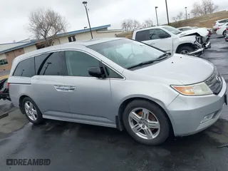 2012 Honda Odyssey Touring with VIN 5FNRL5H99CB055499, listed as a IAAI auction lot 41916534 with 278,435 mi miles. Bid and sale history available at carsss.com. Image 14.