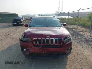 2020 Jeep Cherokee Latitude Plus z VIN 1C4PJMLB6LD585258, wystawiony jako IAAI lot #42411918 z przebiegiem 42 097 mil mil oraz . Historia ofert i sprzedaży dostępna na DreamBid. Obrazek 12.