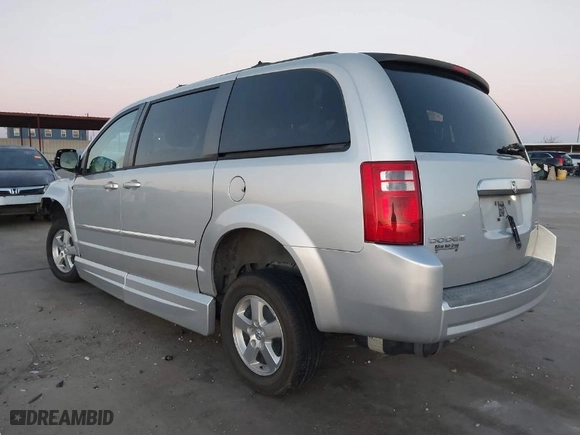 2009 Dodge Grand Caravan SXT with VIN 2D8HN54109R564465, listed as a IAAI auction lot 41372345 with 44,173 mi miles. Bid and sale history available at carsss.com. Image 3.