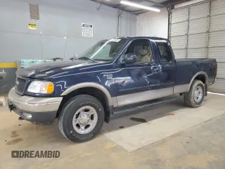 2002 Ford F-150 XL with VIN 1FTRX18L62NA69837, listed as a Copart auction lot 61581935 with 130,078 mi miles and Salvage title. Bid and sale history available at DreamBid. Image 1.