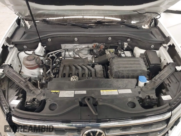 2021 Volkswagen Atlas SE z VIN 1V2HR2CA3MC539997, wystawiony jako IAAI lot #41977786 z przebiegiem 77 372 mil mil oraz . Historia ofert i sprzedaży dostępna na DreamBid. Obrazek 10.
