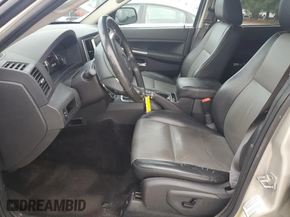 2009 Jeep Grand Cherokee Laredo with VIN 1J8HR48P09C535285, listed as a Copart auction lot 81089844 with 199,931 mi miles and Clean Title. Bid and sale history available at carsss.com. Image 7.