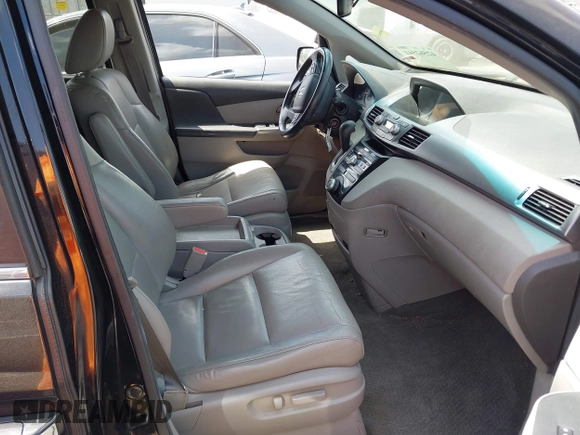2011 Honda Odyssey EX-L with VIN 5FNRL5H62BB063125, listed as a IAAI auction lot 42562541 with 140,787 mi miles and . Bid and sale history available at DreamBid. Image 5.