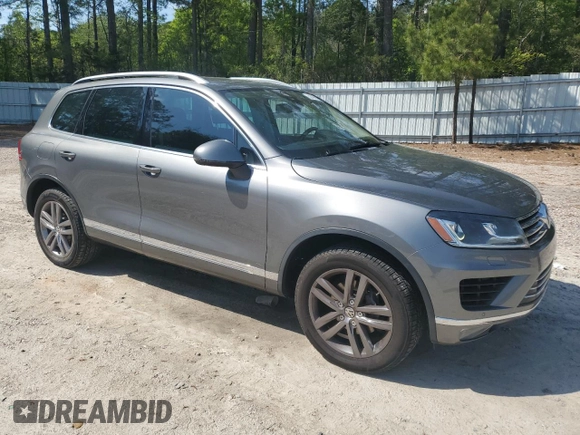 2016 Volkswagen Touareg Sport с VIN WVGEF9BP1GD012594, выставлен на аукционе Copart как лот 52438305 с пробегом 125 204 миль миль и Списание • Salvage title. История ставок и продаж доступна на DreamBid. Изображение 4.