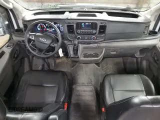 2023 Ford Transit Cargo with VIN 1FTBR3U89PKA70899, listed as a Copart auction lot 77940504 with 62,196 mi miles and Clean Title. Bid and sale history available at DreamBid. Image 8.