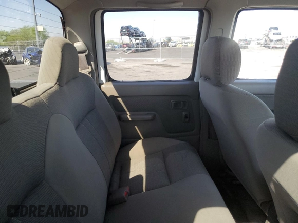 2004 Nissan Frontier XE z VIN 1N6ED27T44C450726, wystawiony jako Copart lot #57004045 z przebiegiem 151 638 mil mil oraz Szkoda całkowita • Salvage title. Historia ofert i sprzedaży dostępna na DreamBid. Obrazek 10.