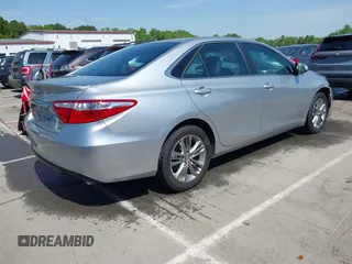 2015 Toyota Camry XLE with VIN 4T1BF1FK1FU100580, listed as a IAAI auction lot 42002060 with 111,739 mi miles. Bid and sale history available at carsss.com. Image 4.