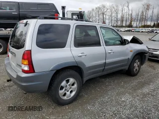 2002 Mazda Tribute LX with VIN 4F2CU08192KM41728, listed as a Copart auction lot 78221954 with 140,782 mi miles and Salvage Title. Bid and sale history available at carsss.com. Image 3.