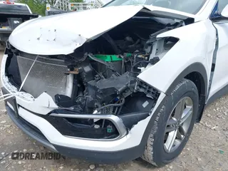2018 Hyundai Santa Fe 2.4L z VIN 5NMZUDLB1JH101842, wystawiony jako IAAI lot #42302237 z przebiegiem 97 376 mil mil oraz . Historia ofert i sprzedaży dostępna na DreamBid. Obrazek 6.