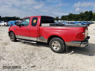 2003 Ford F-150 XL with VIN 1FTRX07WX3KD51374, listed as a Copart auction lot 71796464 with 130,319 mi miles and Salvage Title. Bid and sale history available at carsss.com. Image 2.