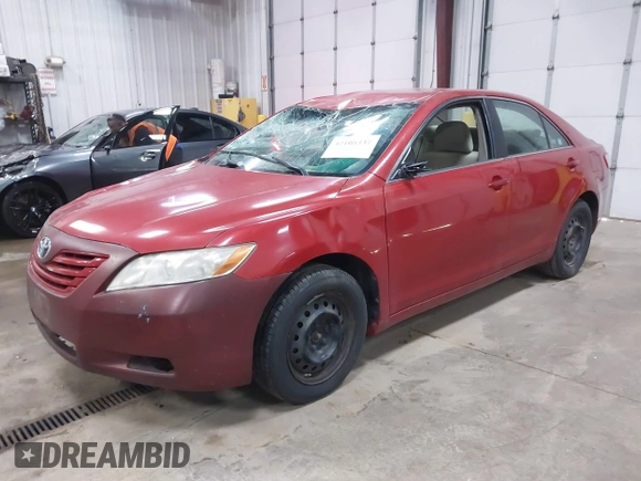 2009 Toyota Camry with VIN 4T4BE46K79R110464, listed as a IAAI auction lot 42108337 with 212,128 mi miles. Bid and sale history available at carsss.com. Image 2.