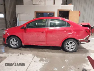 2014 Chevrolet Sonic LT with VIN 1G1JC5SH2E4214489, listed as a IAAI auction lot 41650289 with 93,388 mi miles and . Bid and sale history available at DreamBid. Image 14.