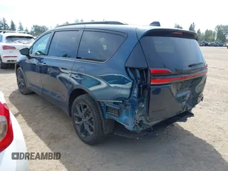 2023 Chrysler Pacifica Limited with VIN 2C4RC3GGXPR555282, listed as a IAAI auction lot 42452848 with 18,373 mi miles and . Bid and sale history available at DreamBid. Image 3.