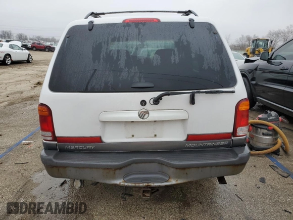 2000 Mercury Mountaineer with VIN 4M2ZU86P4YUJ26343, listed as a Copart auction lot 86396084 with 187,140 mi miles and Salvage title. Bid and sale history available at DreamBid. Image 6.
