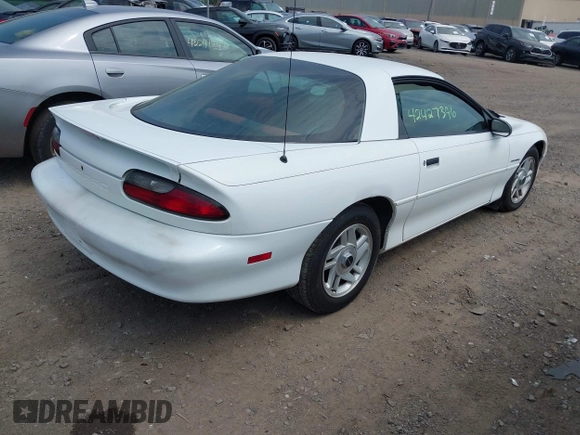 1994 Chevrolet Camaro z VIN 2G1FP22S5R2173095, wystawiony jako IAAI lot #42427396 z przebiegiem 95 713 mil mil oraz . Historia ofert i sprzedaży dostępna na DreamBid. Obrazek 4.
