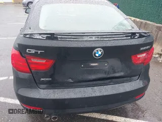 2014 BMW 3 Series 328i Gran Turismo xDrive z VIN WBA3X5C56ED556632, wystawiony jako IAAI lot #41962313 z przebiegiem 99 512 mil mil oraz . Historia ofert i sprzedaży dostępna na DreamBid. Obrazek 6.