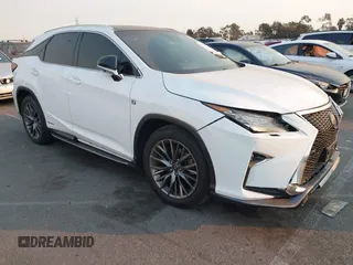 2019 Lexus RX with VIN 2T2BGMCAXKC036573, listed as a IAAI auction lot 41299079 with 104,568 mi miles. Bid and sale history available at carsss.com. Image 1.