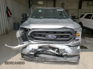 2021 Ford F-150 XL with VIN 1FTFW1E85MKE03933, listed as a Copart auction lot 60513185 with 82,793 mi miles and Salvage title. Bid and sale history available at DreamBid. Image 5.