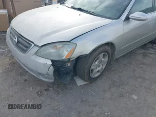2002 Nissan Altima S with VIN 1N4AL11D62C136823, listed as a IAAI auction lot 41625439 with 201,269 mi miles. Bid and sale history available at carsss.com. Image 6.