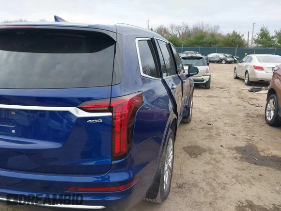 2023 Cadillac XT6 AWD Premium Luxury with VIN 1GYKPDRS2PZ126666, listed as a IAAI auction lot 40963833 with 23,535 mi miles and . Bid and sale history available at DreamBid. Image 6.