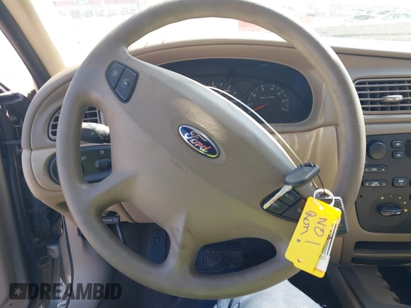 2003 Ford Taurus SE Standard with VIN 1FAFP53U73A245044, listed as a IAAI auction lot 41999582 with 85,870 mi miles. Bid and sale history available at carsss.com. Image 11.