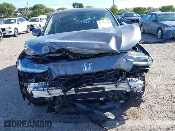 2025 Honda HR-V EX-L z VIN 3CZRZ1H72SM700908, wystawiony jako IAAI lot #41172857 z przebiegiem 6229 mil mil oraz . Historia ofert i sprzedaży dostępna na DreamBid. Obrazek 13.