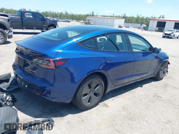 2022 Tesla Model 3 Long Range z VIN 5YJ3E1EB6NF106038, wystawiony jako IAAI lot #42214585 z przebiegiem 40 667 mil mil oraz . Historia ofert i sprzedaży dostępna na DreamBid. Obrazek 4.