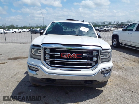 2018 GMC Sierra 1500 SLT z VIN 3GTU2NEC9JG240754, wystawiony jako IAAI lot #41890229 z przebiegiem 183 966 mil mil oraz . Historia ofert i sprzedaży dostępna na DreamBid. Obrazek 12.