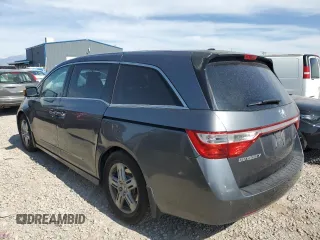 2012 Honda Odyssey Touring с VIN 5FNRL5H95CB120347, выставлен на аукционе Copart как лот 59111775 с пробегом 208 419 миль миль и Списание • Salvage title. История ставок и продаж доступна на DreamBid. Изображение 2.