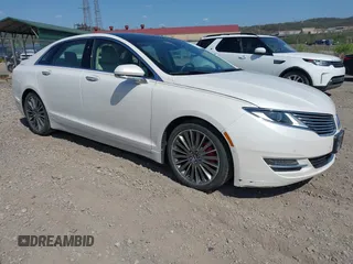 2014 Lincoln MKZ with VIN 3LN6L2J9XER808773, listed as a IAAI auction lot 42112712 with 105,832 mi miles. Bid and sale history available at carsss.com. Image 1.