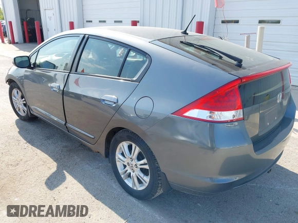 2011 Honda Insight EX with VIN JHMZE2H7XBS006254, listed as a IAAI auction lot 42222213 with 244,078 mi miles and . Bid and sale history available at DreamBid. Image 3.