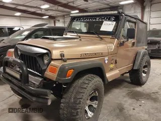 2000 Jeep Wrangler Sahara with VIN 1J4FA59S2YP740431, listed as a IAAI auction lot 41313079 with 183,989 mi miles. Bid and sale history available at carsss.com. Image 2.