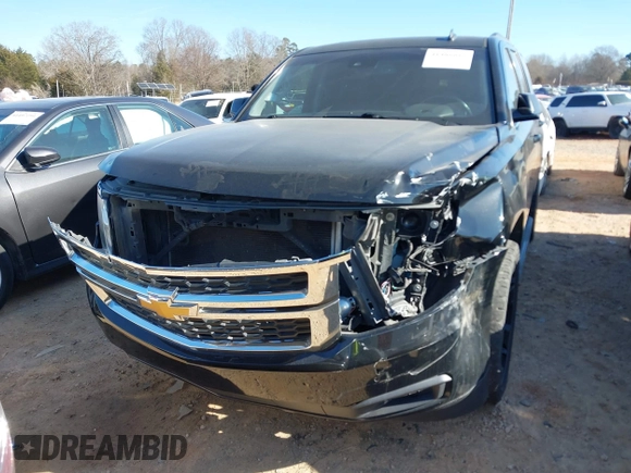 2015 Chevrolet Tahoe LT with VIN 1GNSCBKC5FR156050, listed as a IAAI auction lot 41486815 with 220,599 mi miles and . Bid and sale history available at DreamBid. Image 12.