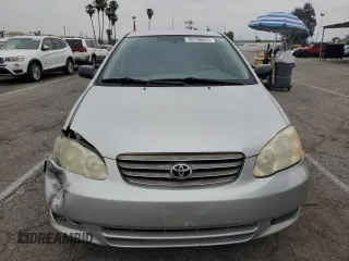 2004 Toyota Corolla CE with VIN 1NXBR32E54Z202173, listed as a Copart auction lot 55756845 with 166,700 mi miles and Salvage Title. Bid and sale history available at DreamBid. Image 5.