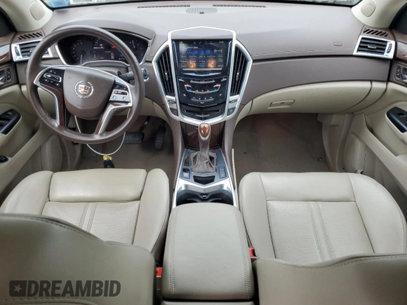 2015 Cadillac SRX Luxury Collection z VIN 3GYFNEE33FS574163, wystawiony jako Copart lot #56667985 z przebiegiem 103 697 mil mil oraz Szkody całkowita. Historia ofert i sprzedaży dostępna na DreamBid. Obrazek 8.