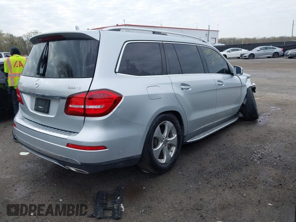 2017 Mercedes-Benz GLS 450 with VIN 4JGDF6EE9HA787099, listed as a IAAI auction lot 41971505 with 80,159 mi miles and . Bid and sale history available at DreamBid. Image 4.