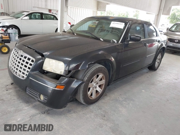 2007 Chrysler 300 Touring with VIN 2C3KA53G17H869258, listed as a IAAI auction lot 42399212 with 237,633 mi miles and . Bid and sale history available at DreamBid. Image 2.
