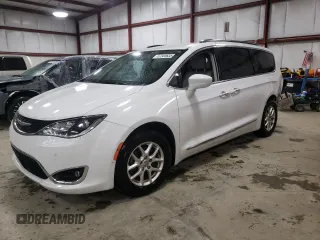 2020 Chrysler Pacifica Touring L with VIN 2C4RC1BGXLR128514, listed as a Copart auction lot 57333635 with 71,109 mi miles and Salvage title. Bid and sale history available at DreamBid. Image 1.