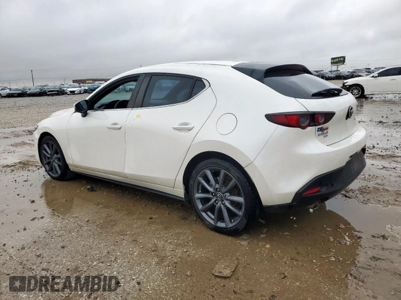 2019 Mazda 3 with VIN JM1BPBJM2K1136404, listed as a Copart auction lot 60378665 with 61,903 mi miles and Salvage title. Bid and sale history available at DreamBid. Image 2.