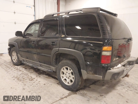 2004 Chevrolet Tahoe LS with VIN 1GNEK13T24R242907, listed as a IAAI auction lot 41496795 with 261,402 mi miles. Bid and sale history available at carsss.com. Image 3.